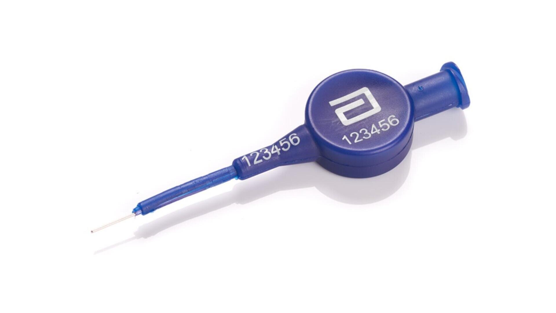 A blue medical device with a round body labeled 123456 and a stylized white logo, attached to a thin wire extending from one end, placed on a white background.