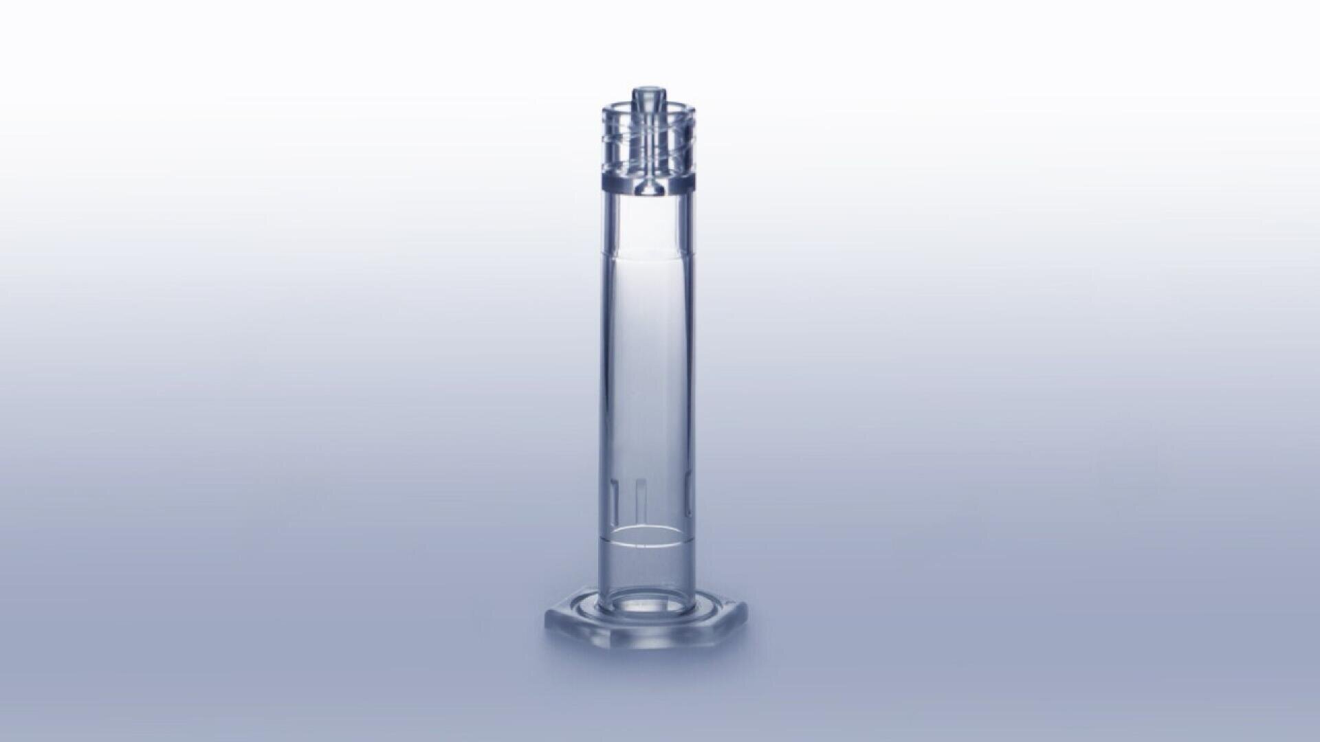 A clear, cylindrical plastic container with a flat base and a detailed, ridged top, standing upright against a gradient light blue background.