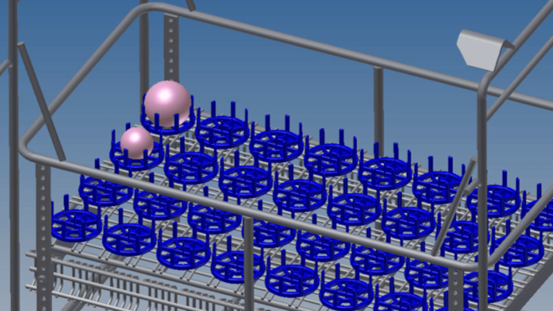 Ein digitales Rendering zeigt mehrere kreisförmige blaue Regale mit vertikalen Zacken, die auf Metallregalen angeordnet sind. Zwei rosa Kugeln, eine kleine und eine größere, sind zwischen den Regalen platziert. Darüber ist eine Lichtquelle zu sehen.