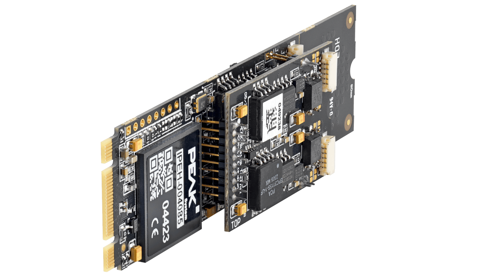 Two black computer boards, one larger and one smaller, are connected with golden plugs and various chips, which can be seen on a plain white background.
