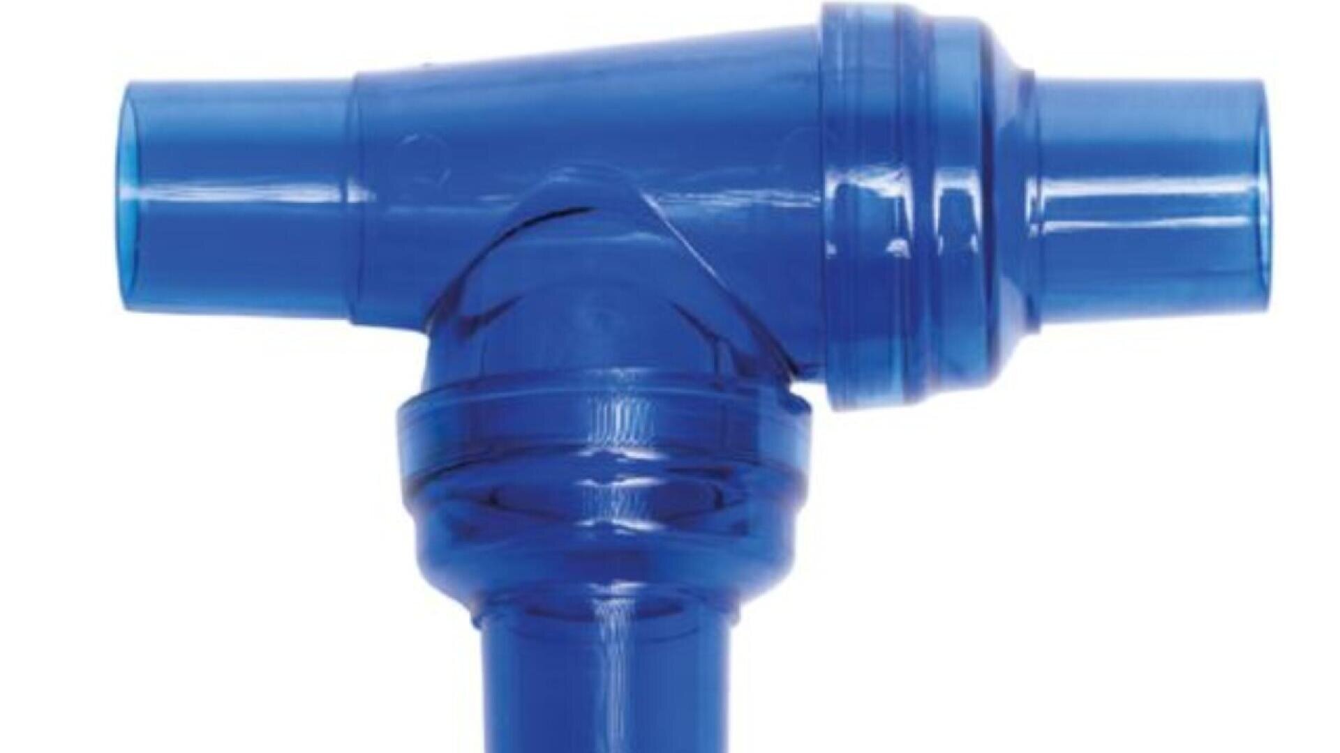 A close-up of a transparent blue plastic medical Y-connector, typically used for respiratory or ventilator tubing, against a white background.