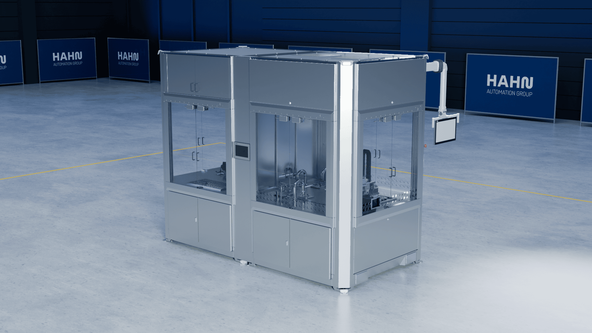 Eine große, moderne Industrieautomatisierungsmaschine mit Glasplatten und Touchscreen-Display steht in einer geräumigen, sauberen Anlage mit blauen Wänden und Schildern der HAHN Automation Group.