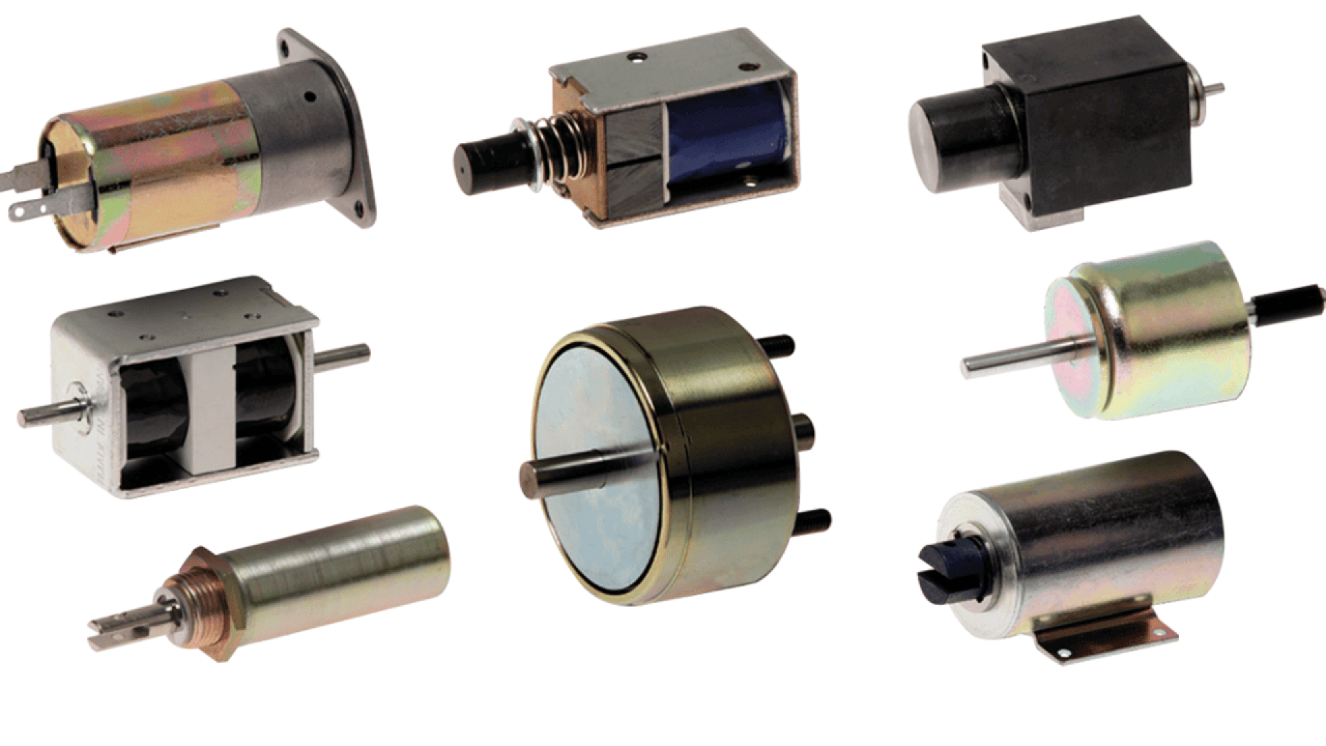 A collection of seven different metal solenoids and actuators of various shapes and sizes, arranged on a white background.