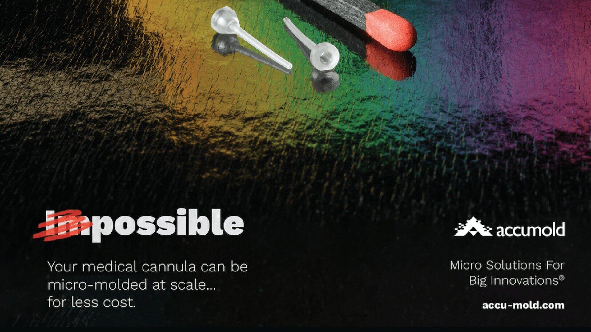 A matchstick beside two tiny clear medical cannulas on a textured, colorful surface with the word Impossible edited to read possible and Accumold branding and slogan in white text.