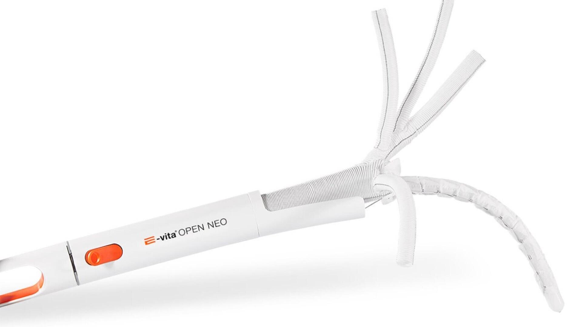 A close-up of a medical device labeled Evita OPEN NEO with an orange button and several flexible, white ribbon-like extensions at one end. The background is plain white.