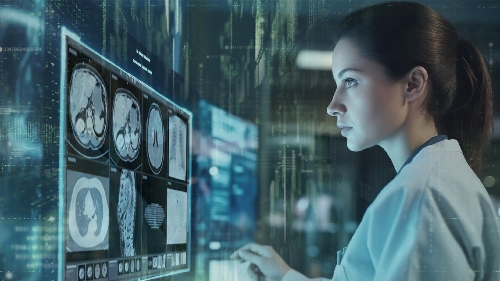 A medical professional examines multiple radiology scans displayed on digital monitors, focusing intently in a high-tech, dimly lit environment.