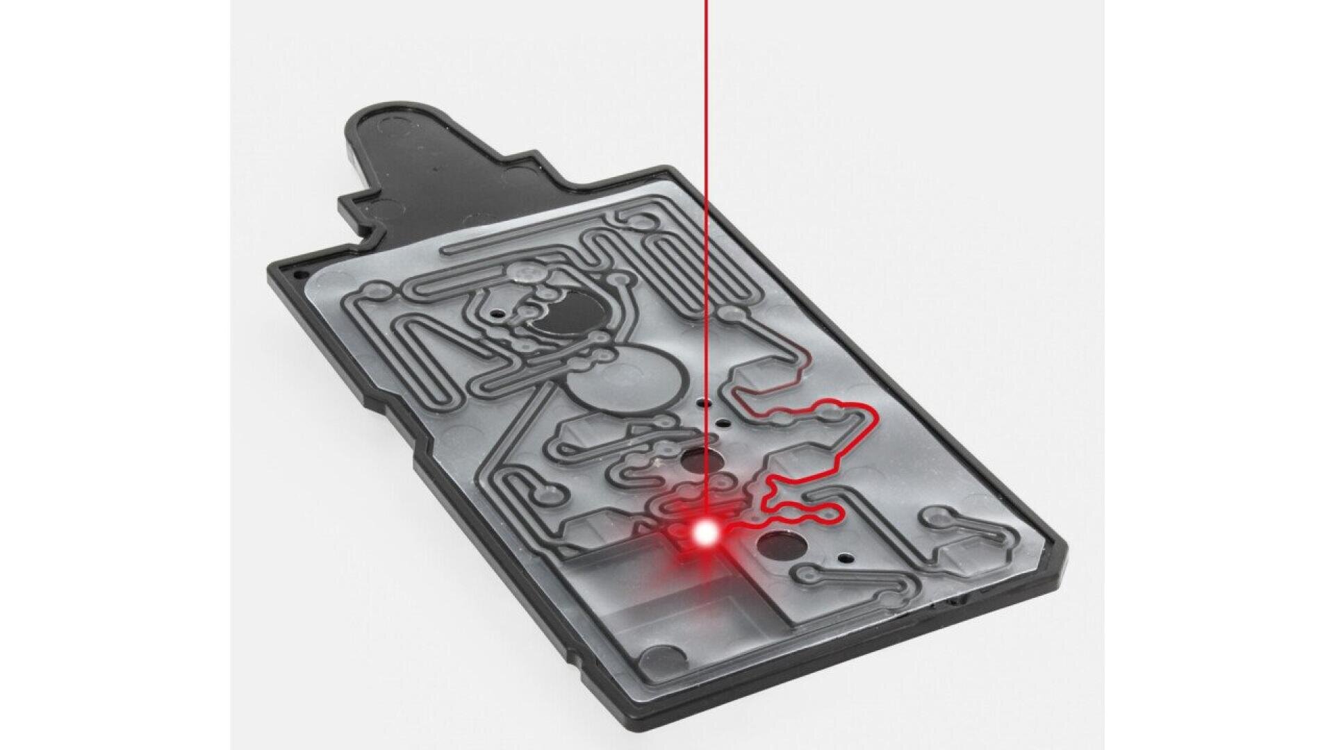A black game board resembling a simplified anatomy diagram features a red laser line moving along a winding path, simulating a game challenge where the player avoids the edges.