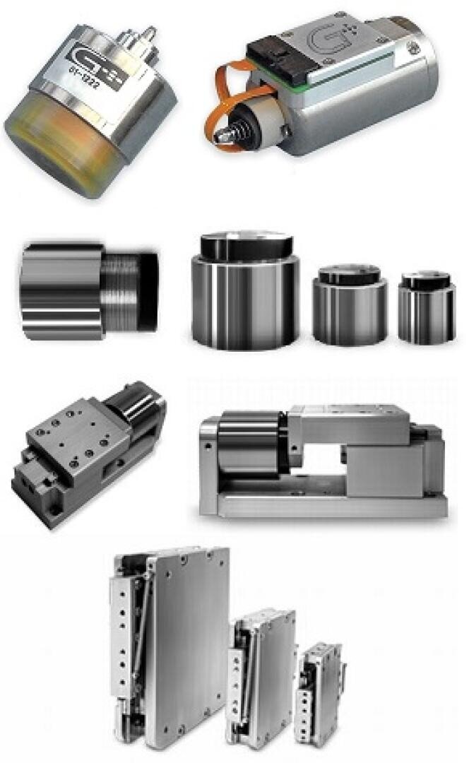 A collection of various precision mechanical components, including actuators, linear guides, rotary joints, and metal bearings, arranged in rows against a white background.