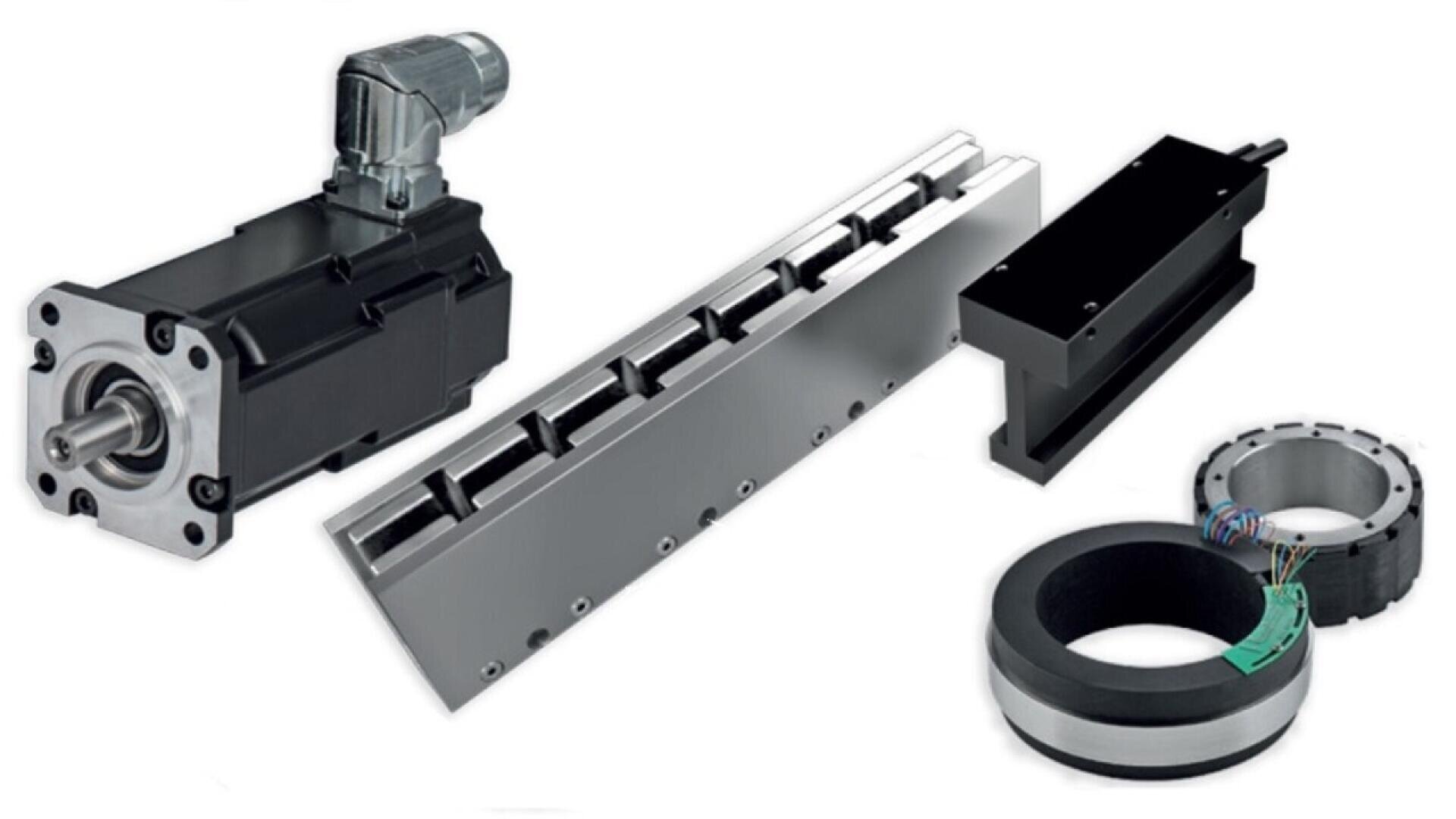 A collection of industrial automation components, including a servo motor, a linear rail with a carriage, a black rectangular actuator, and two circular motor stator-rotor assemblies.