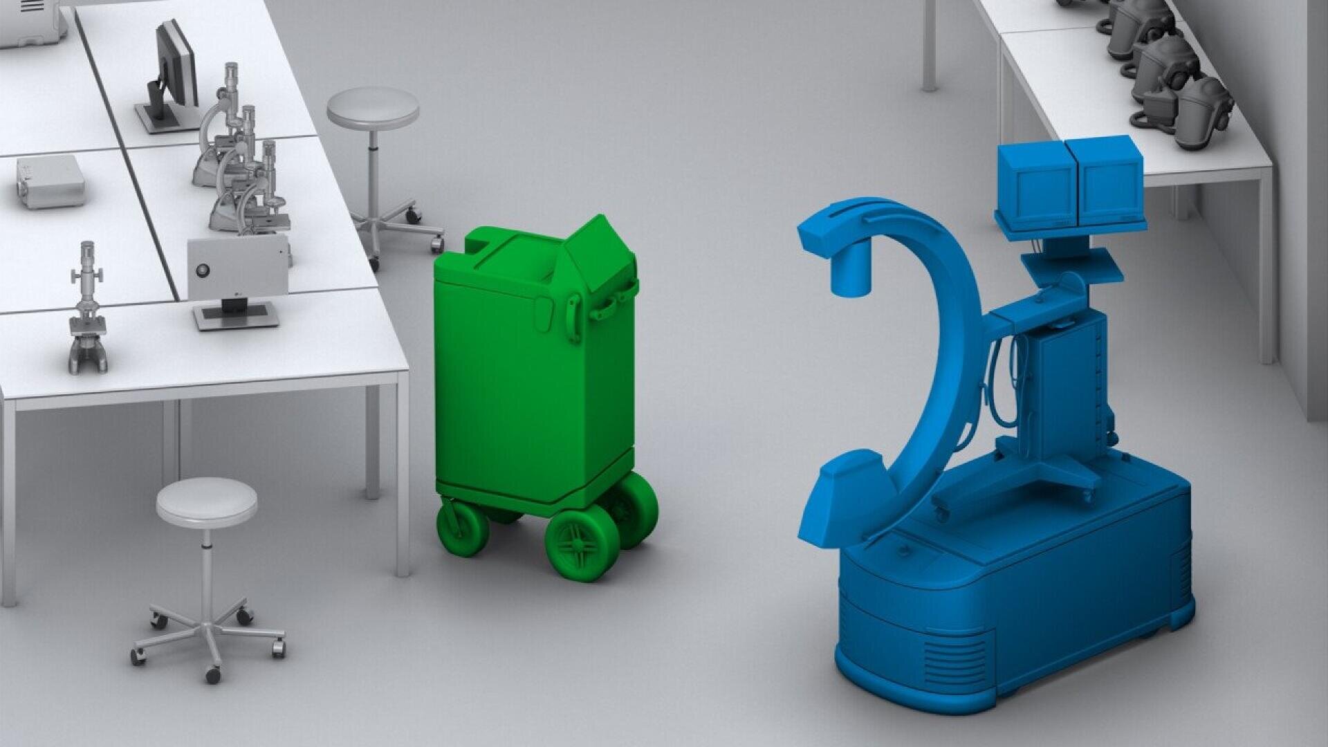 A green wheeled bin and a blue medical imaging machine are positioned in a laboratory setting with white tables, stools, and several microscopes on the counters.