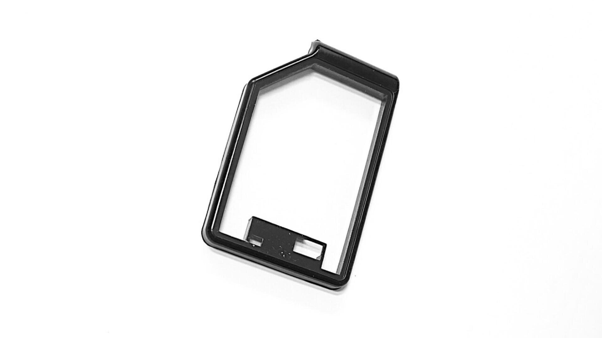 A black, rectangular plastic frame with an angled top edge and small cutouts at the bottom, placed on a plain white background.